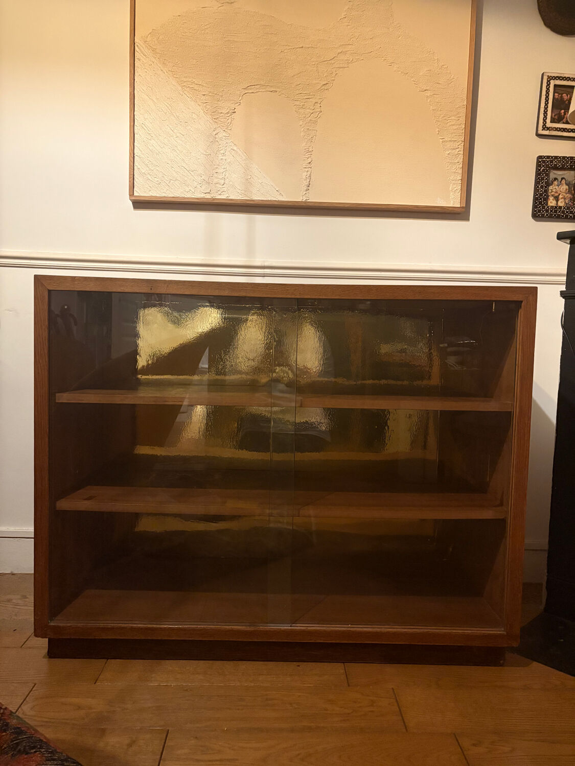 Wooden display cabinet with sliding doors