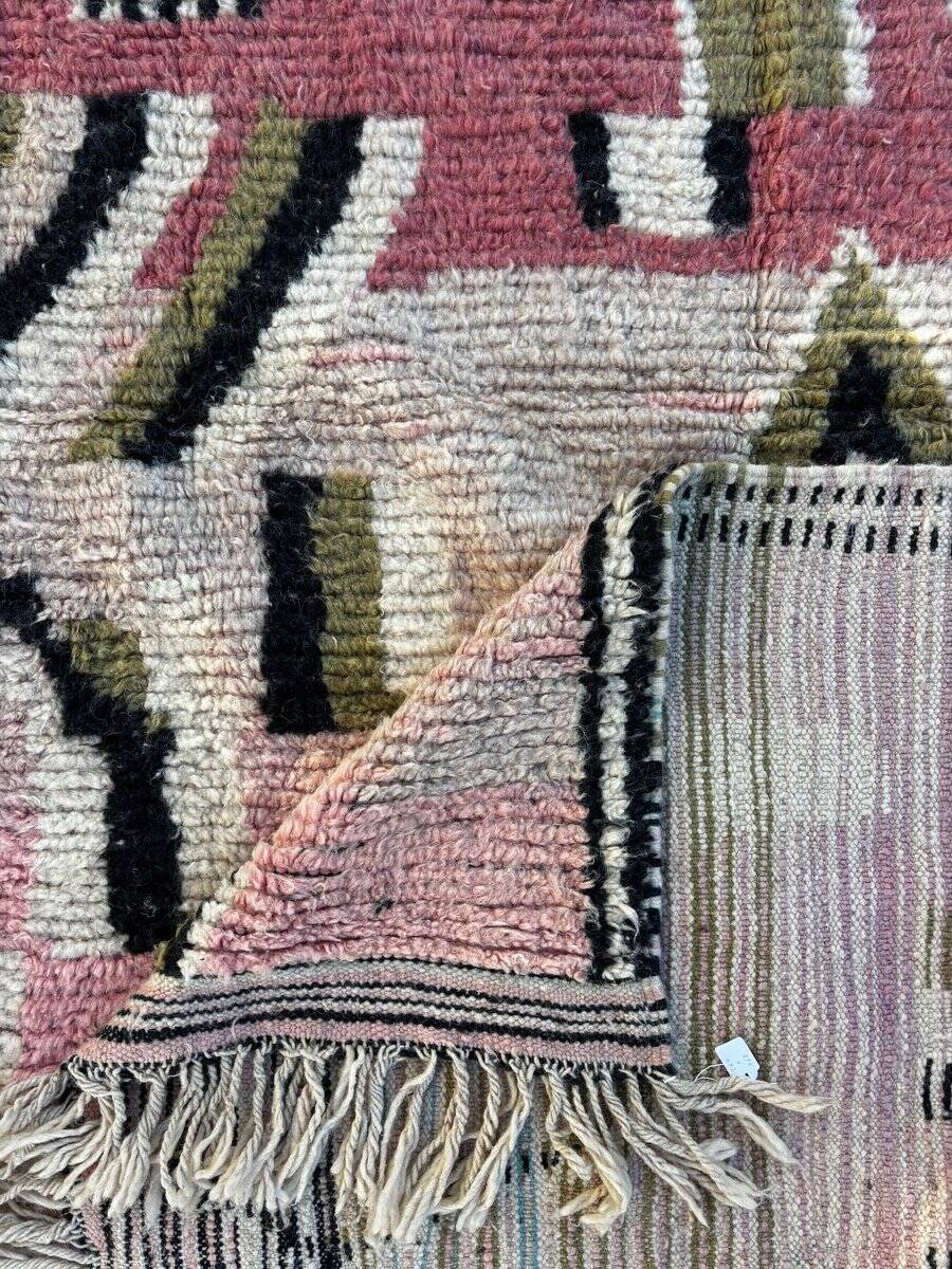 Pink and red Berber Boujad rug in wool, bohemian decor.