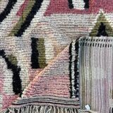 Pink and red Berber Boujad rug in wool, bohemian decor.