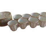 Set of 8 pairs of cups and saucers in Paris porcelain