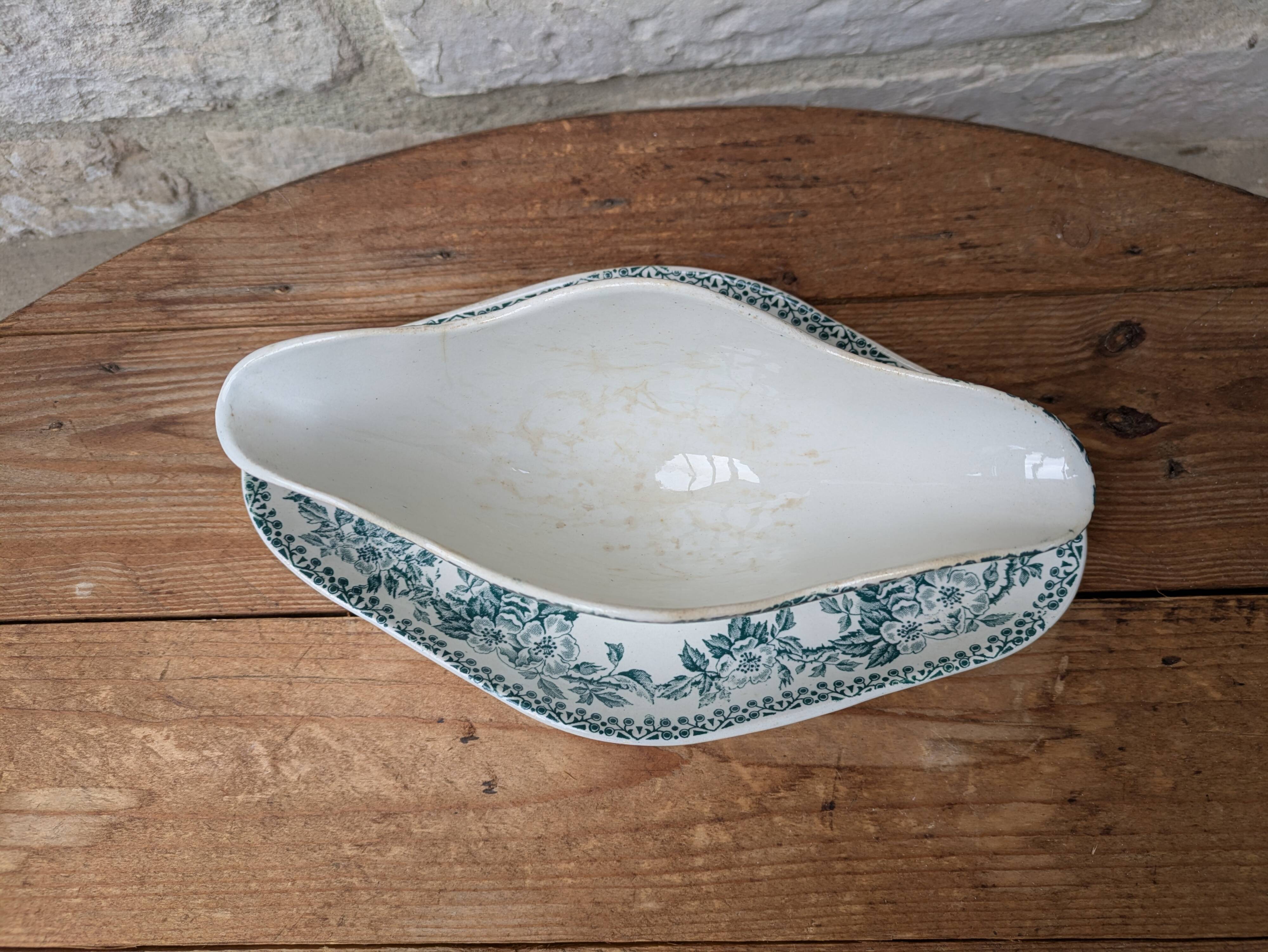 Old sauce boat on fixed frame Guadeloupe Saint Amand ceramic model