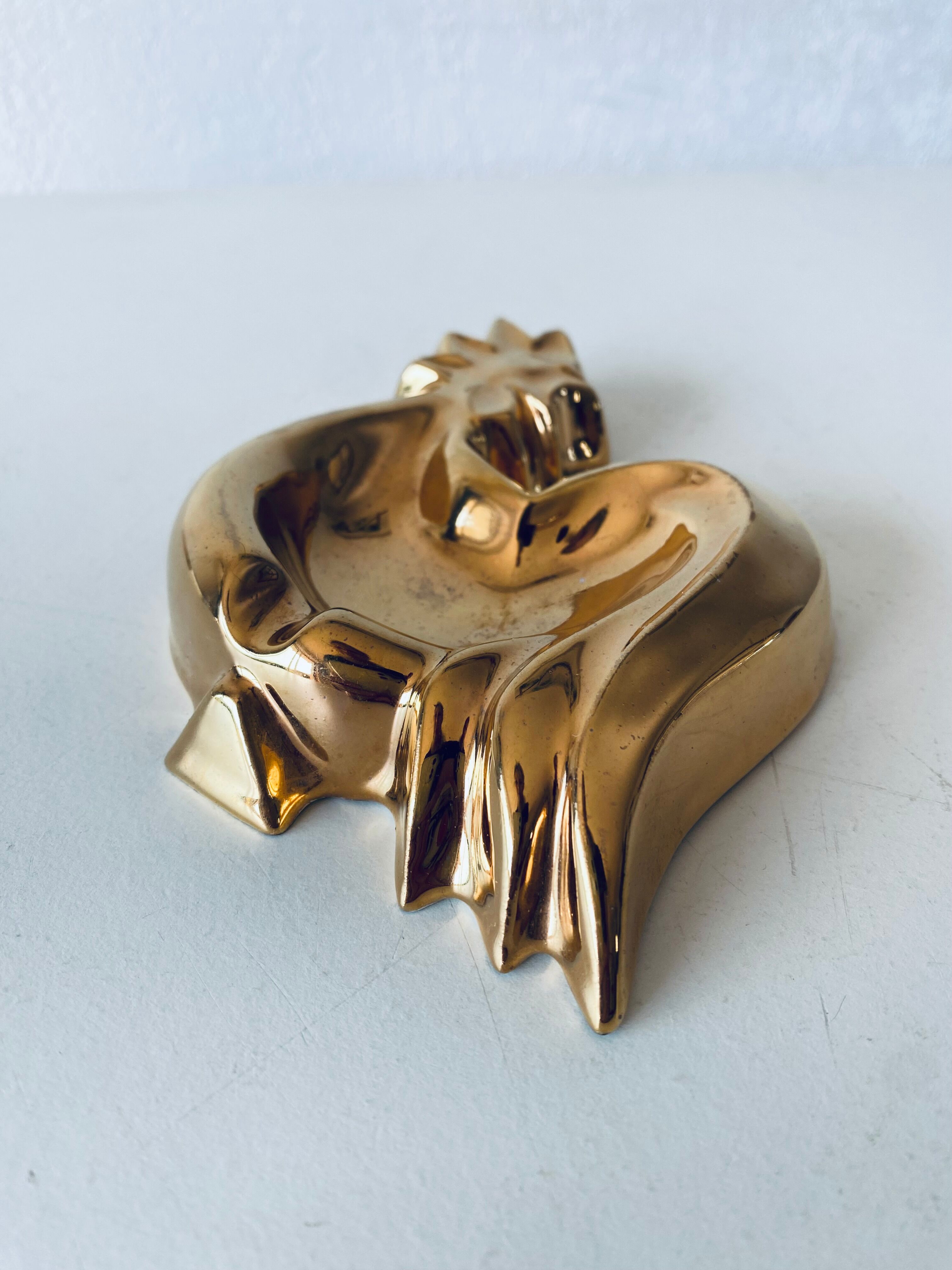 Vintage rooster in gilded ceramic