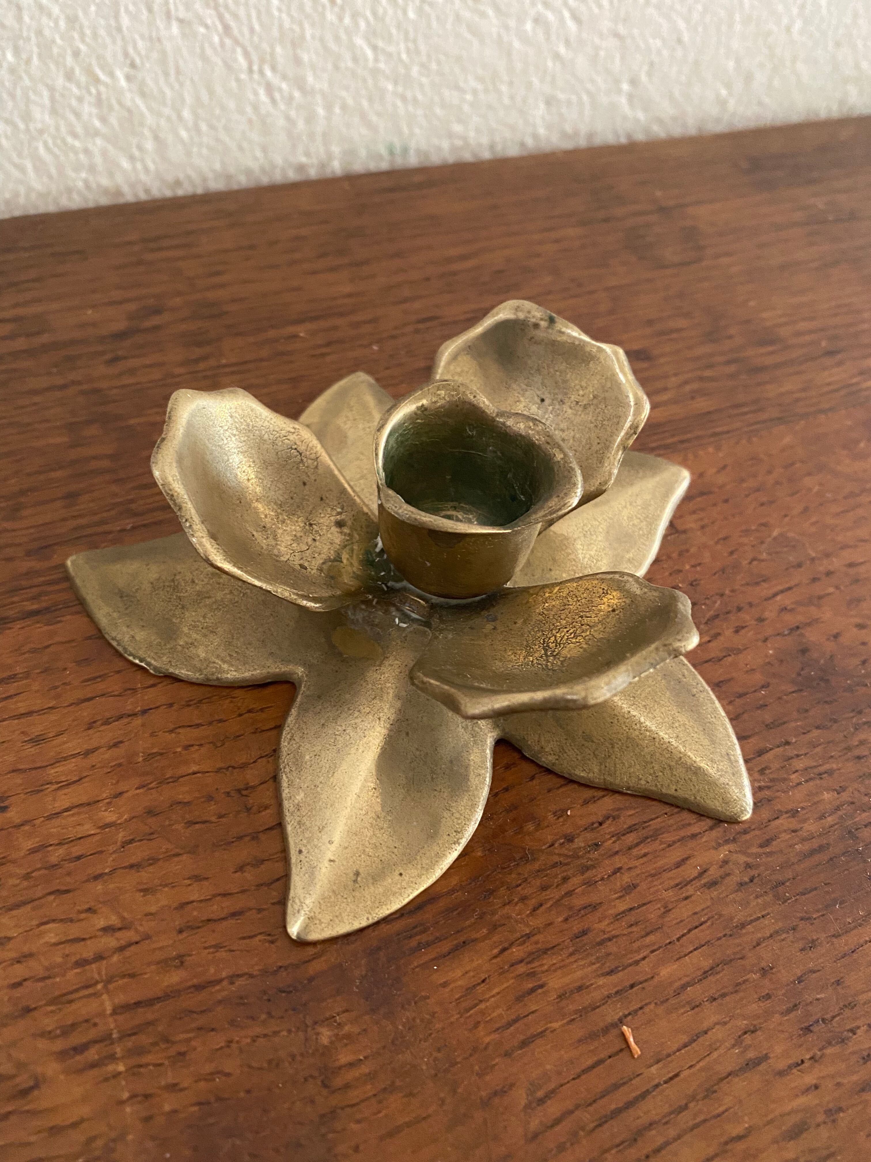 Brass flower candle holder.