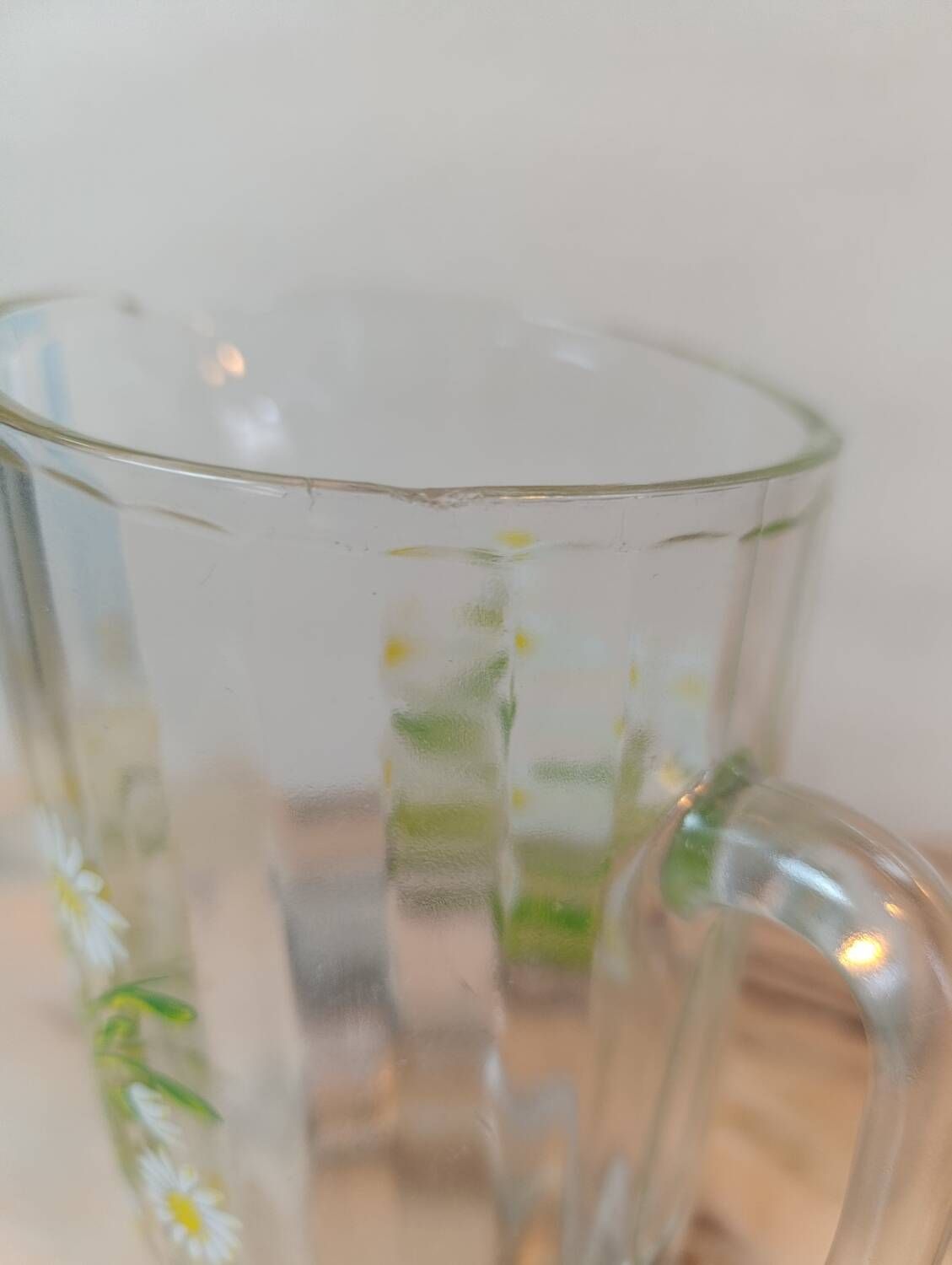 Orangeade service with a jug and six glasses featuring a daisy pattern.