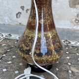 Glass lamp base with dried flowers