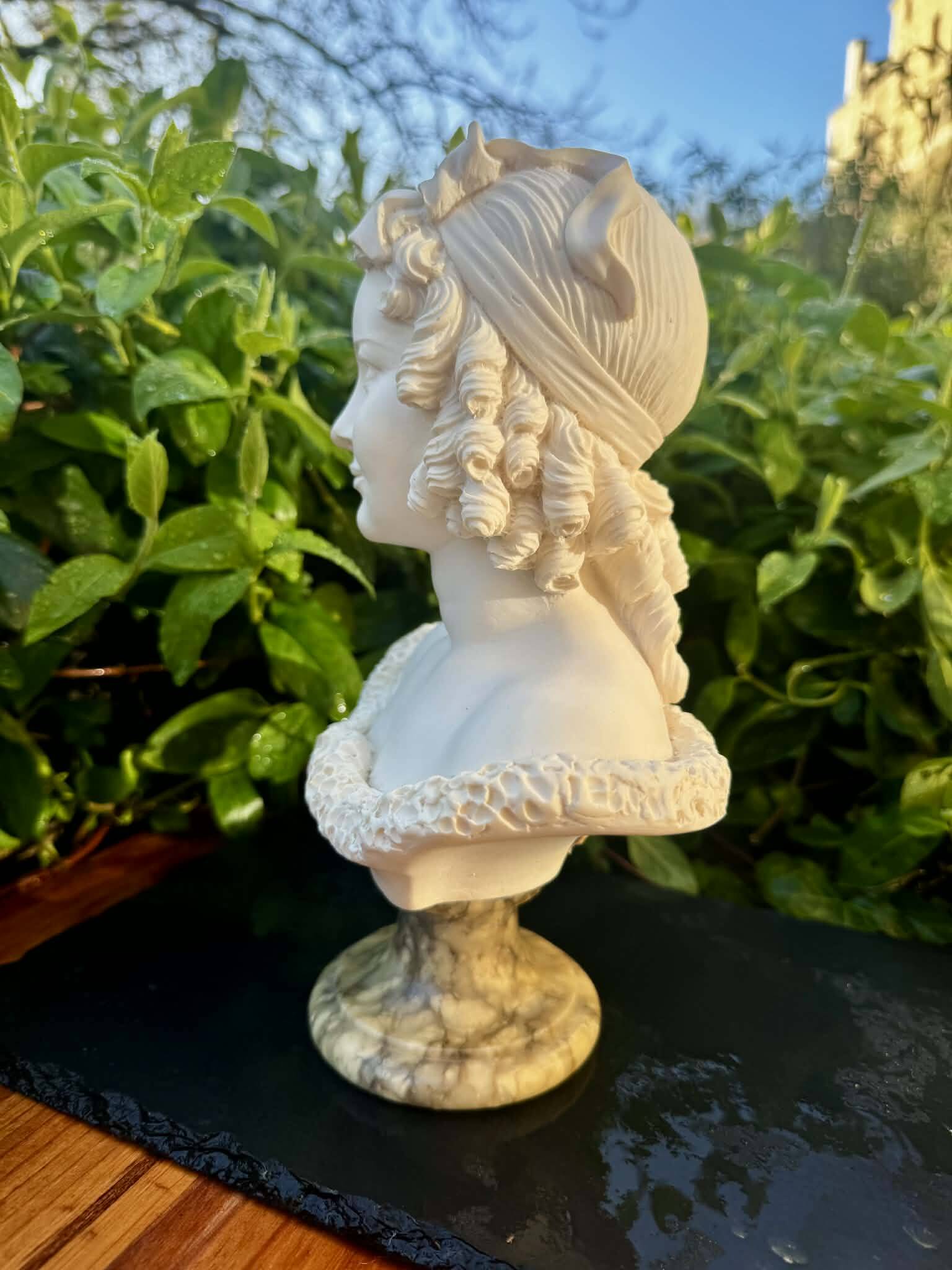 Bust of a woman signed Arnaldo Giannelli dated 1972.