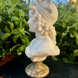 Bust of a woman signed Arnaldo Giannelli dated 1972.