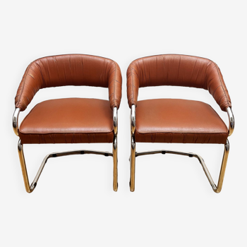 Paire de fauteuils en cuir année 70