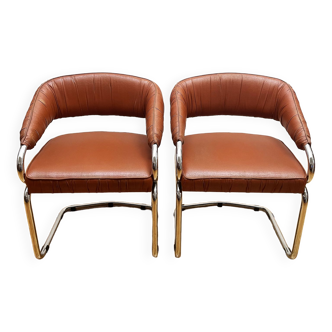 Pair of leather armchairs year 70