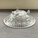 Empty glass pocket on three legs