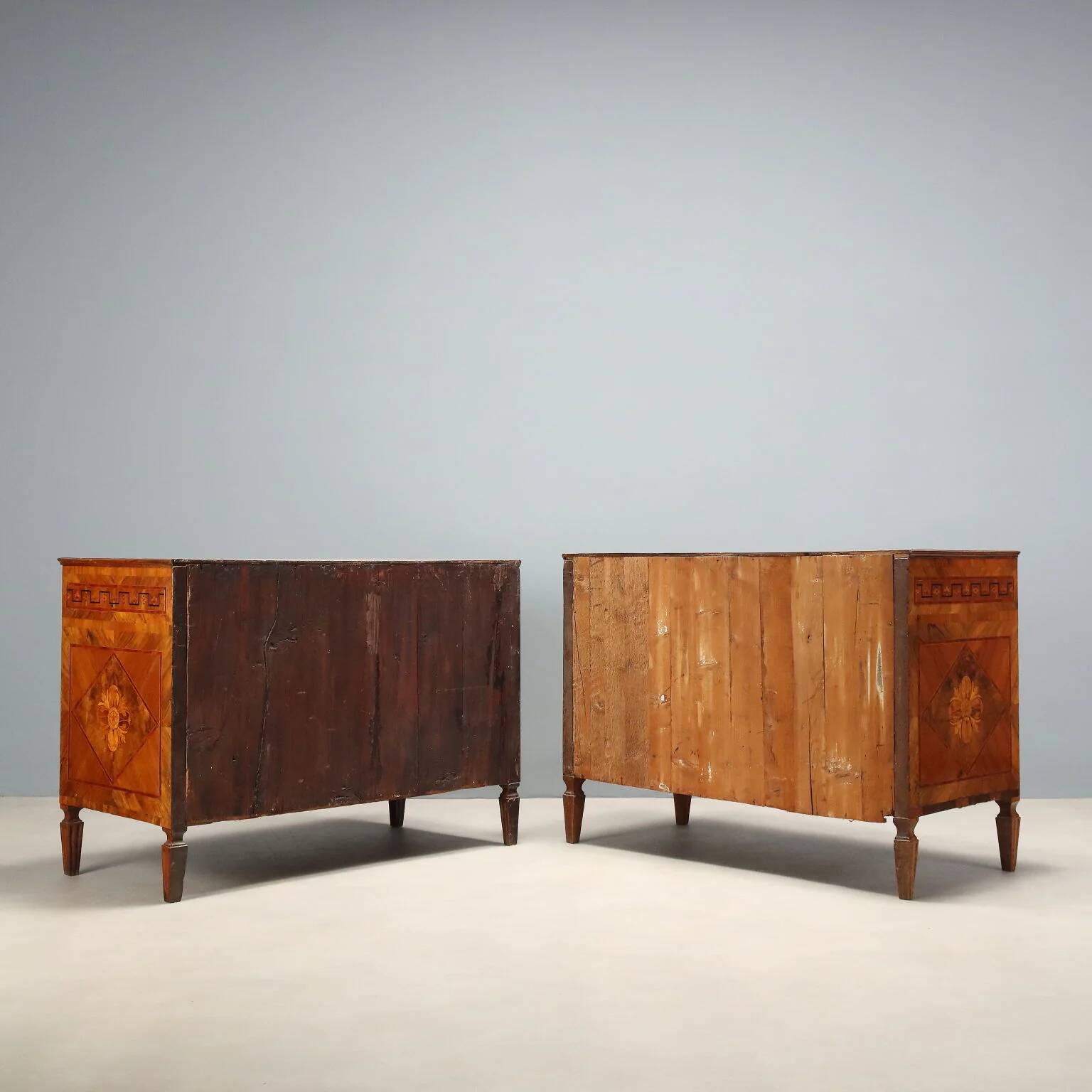 Pair of antique neoclassical walnut commodes from the 18th century.