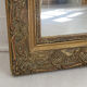 Small old mirror in gilded wood