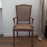 Antique Louis XVI style armchair in wood and caning