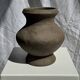 Small brutalist handcrafted terracotta vase with a pedestal, Indonesian, H19 D17.