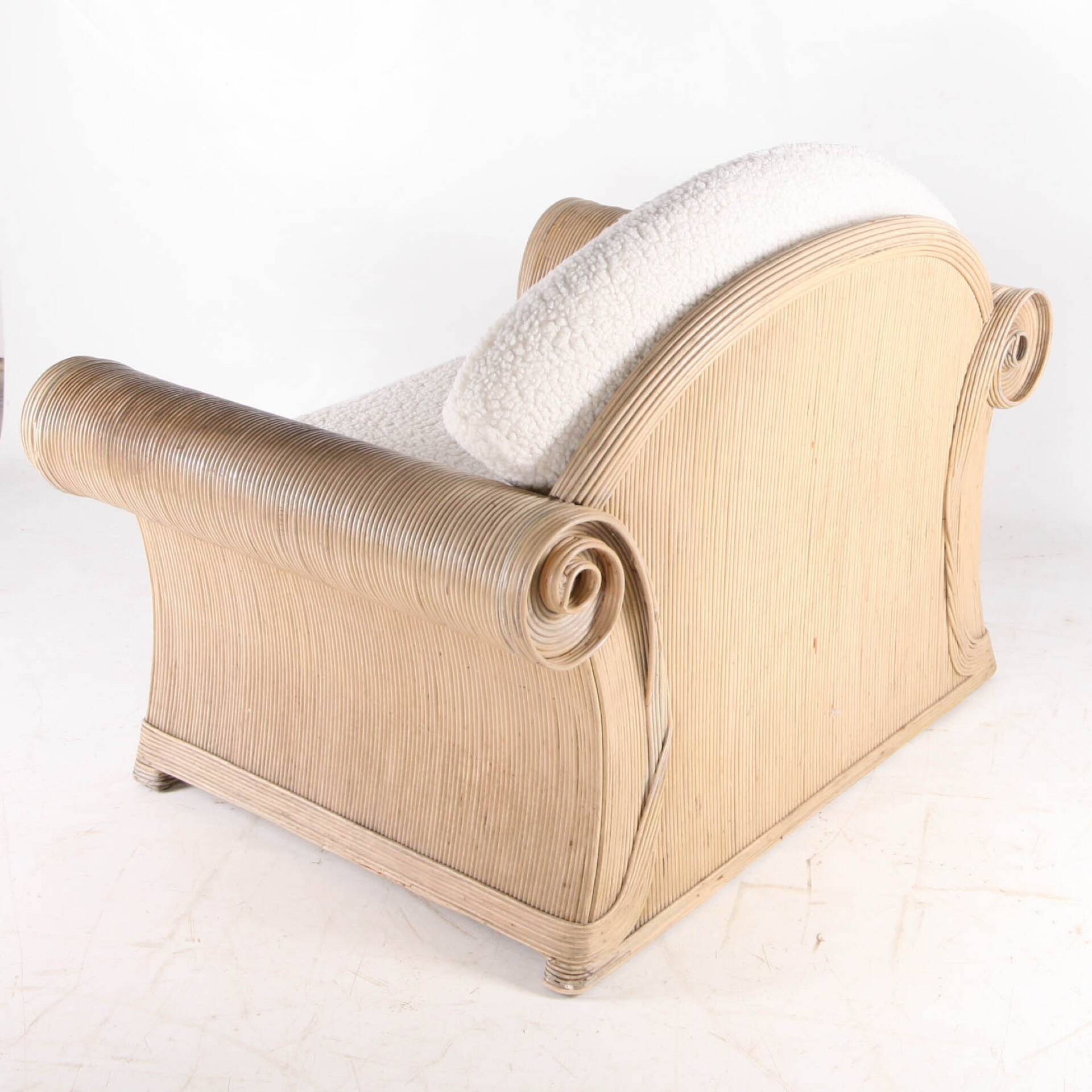 Rattan armchair by Betty Cobonpue
