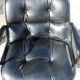 POLLOCK black leather reclining armchair with casters