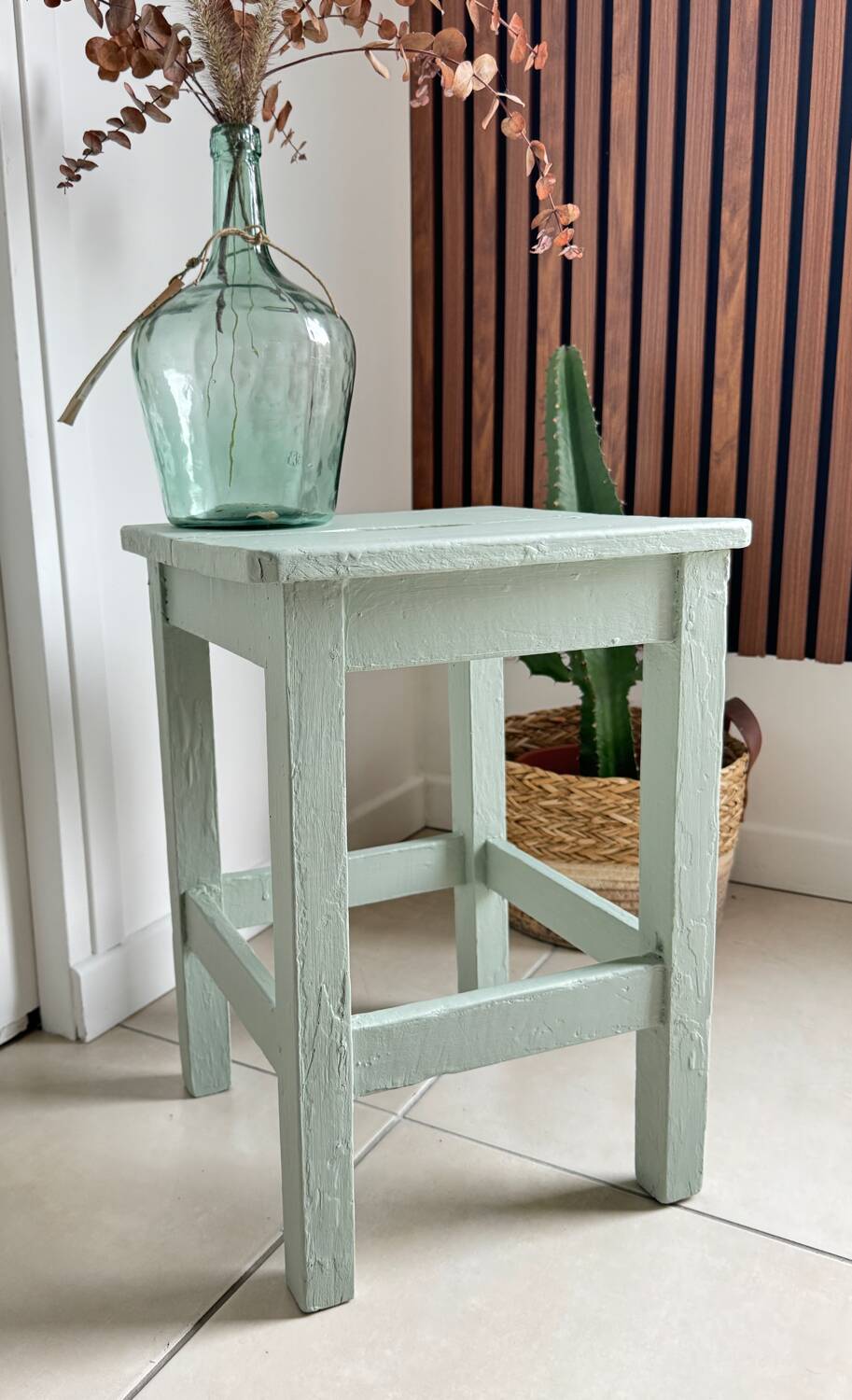 Antique almond green wooden stool