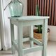 Antique almond green wooden stool
