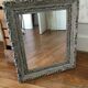 Antique patinated mirror