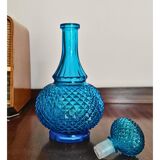 Bouteille en verre bleu belge vintage