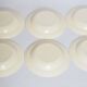 Lot 18 assiettes plates, creuses et dessert 1980
