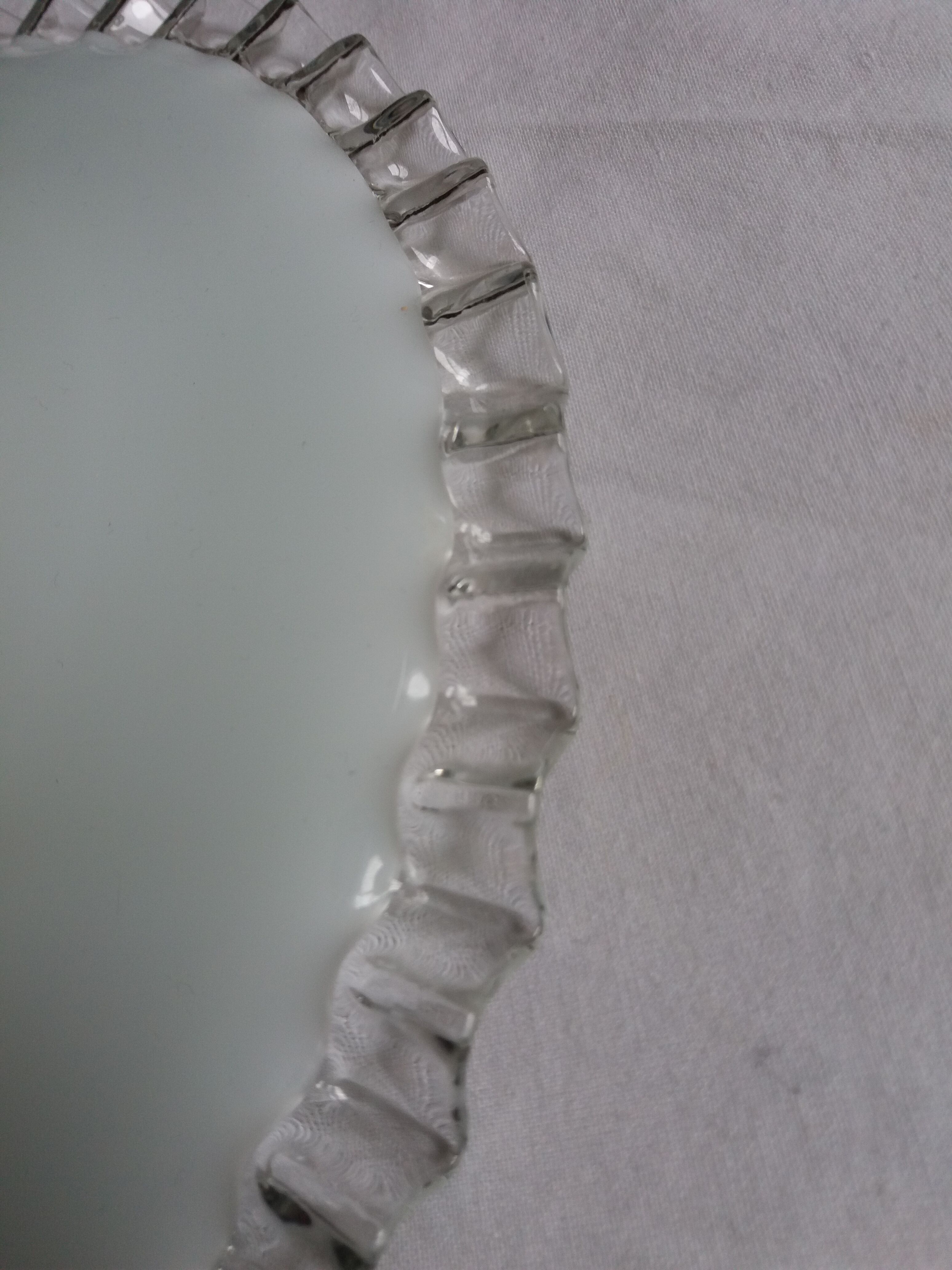 White opaline daylight and transparent wavy edge