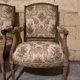 Pair of antique carved wooden armchairs