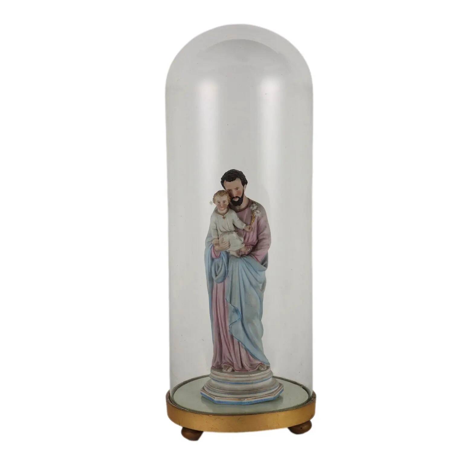Ancient sculpture of Saint Joseph in a display case, Italy 1900s, polychrome porcelain.