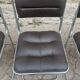 Four vintage chairs from the 1960s and 1970s, chrome with faux leather.