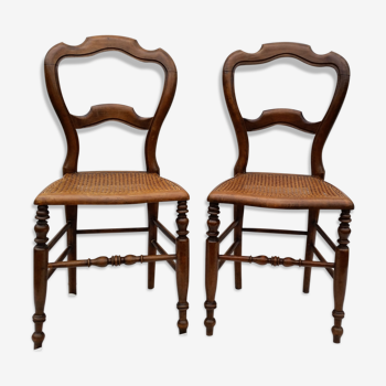 Paire de 2 anciennes chaises cannées
