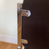 Pair of brown low chairs with chrome base