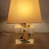 Boat lamp integrated into the base