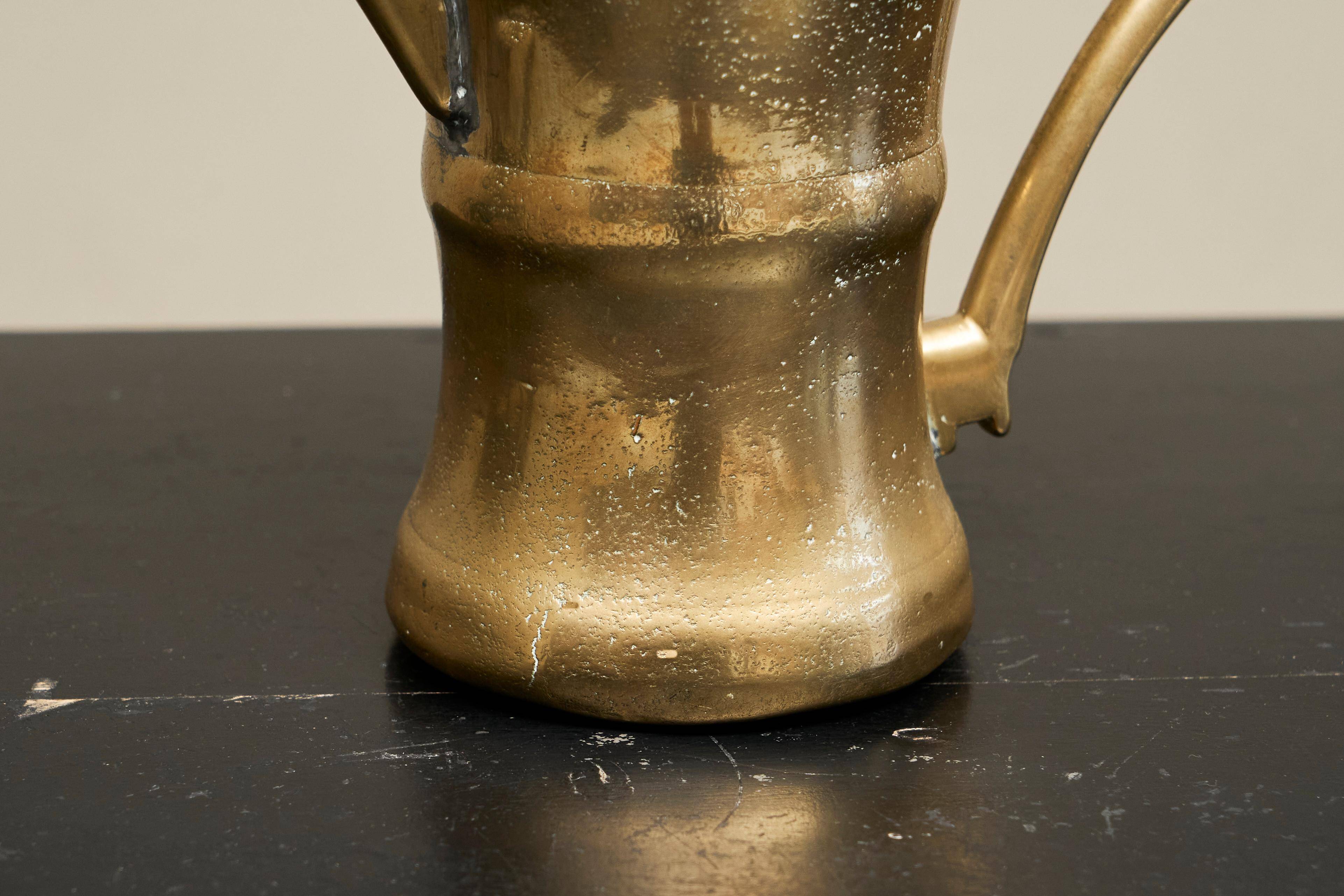 Antique brass jug, 19th century.