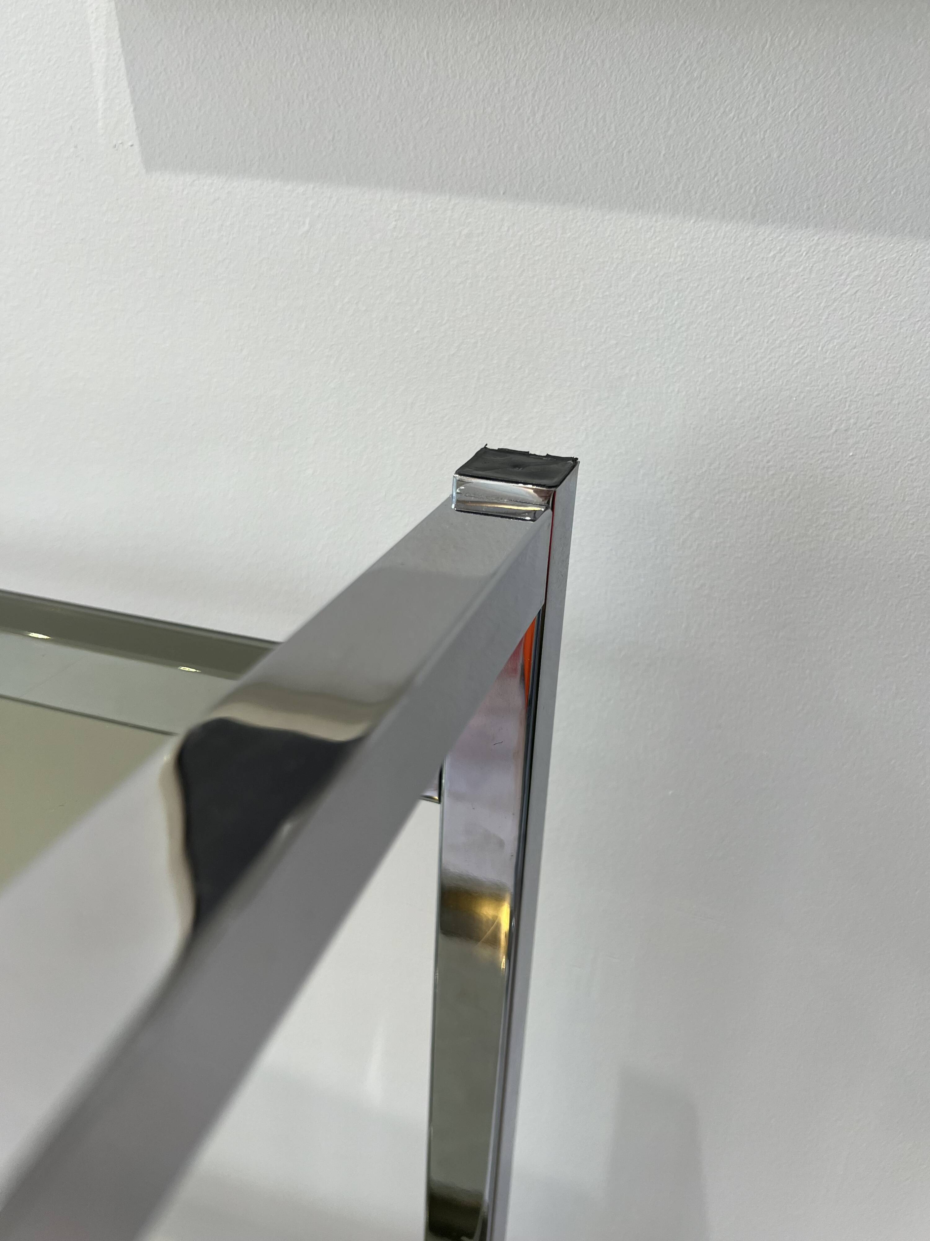 Chrome and smoked glass bookcase/shelf, circa 1970