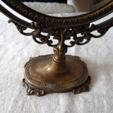 Psyche on foot brass mirror 28x39cm