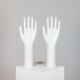Pair of authentic vintage jewellery displays in industrial porcelain representing hands.
