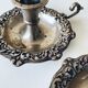Pair of silver metal candlesticks