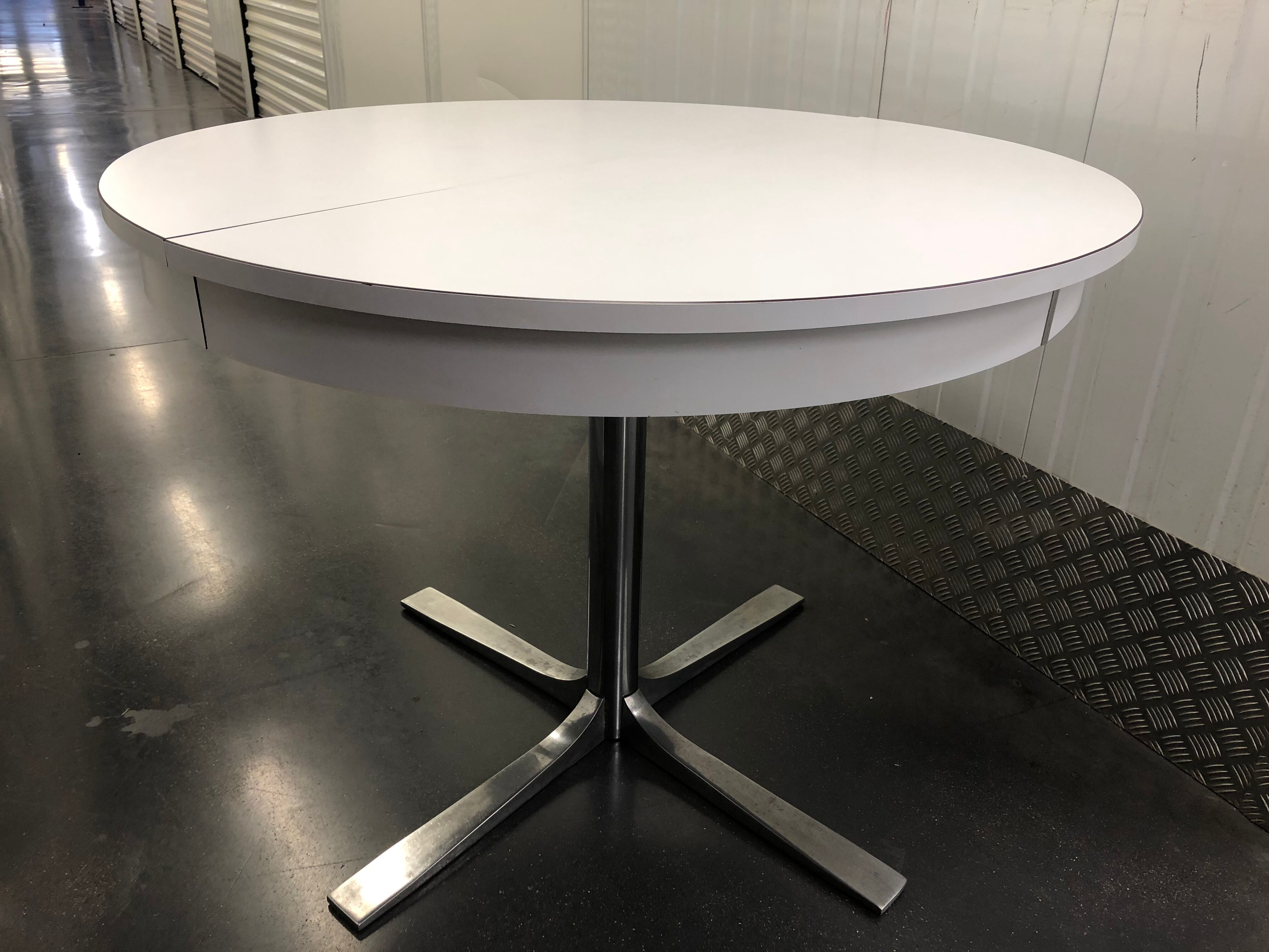 Rosalie round table with white extensions and chrome foot circa 1970