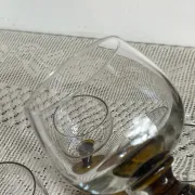 Footed glasses of the Roemer type, amber colour