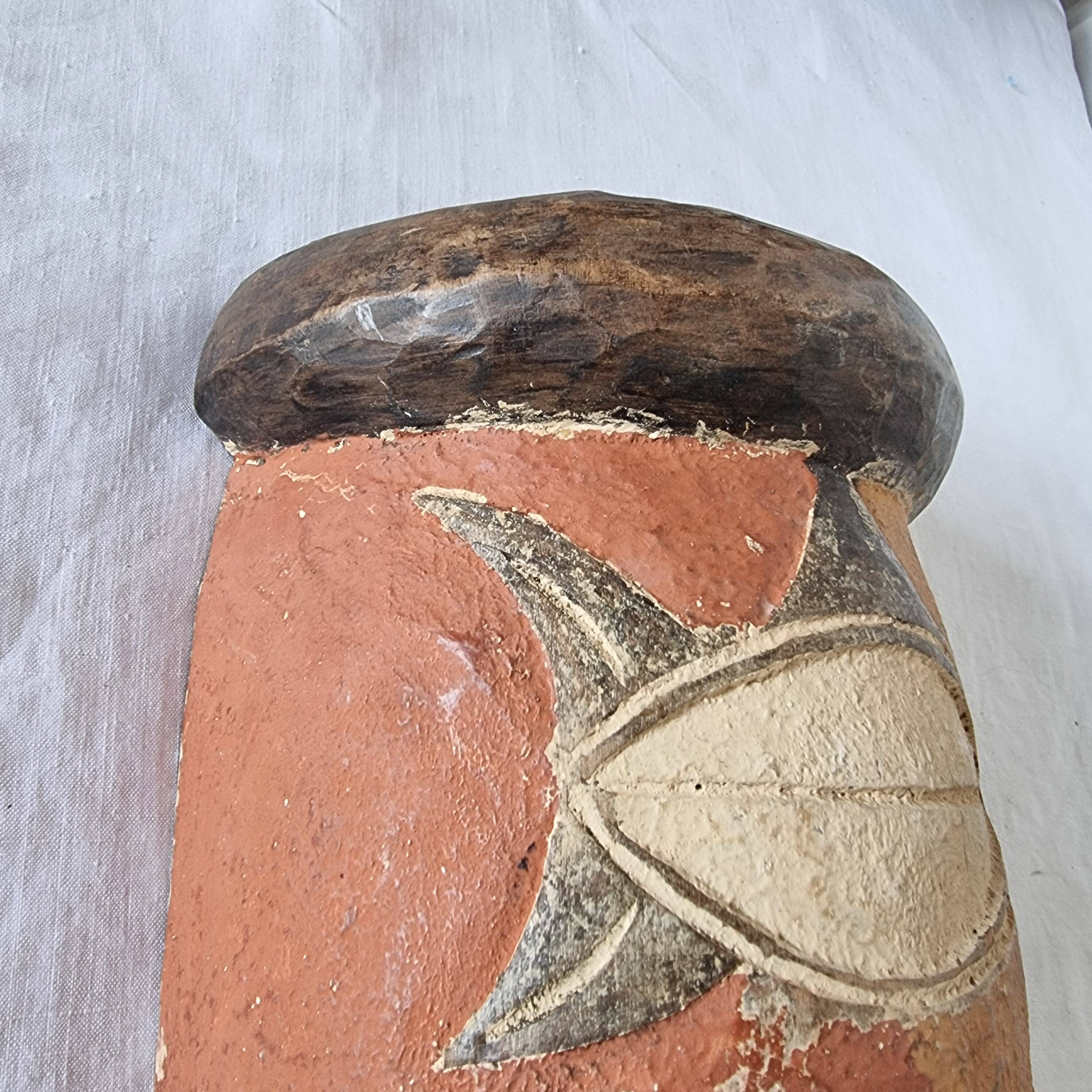 Wooden mask baule carved and hand painted with natural pigments from ivory coast