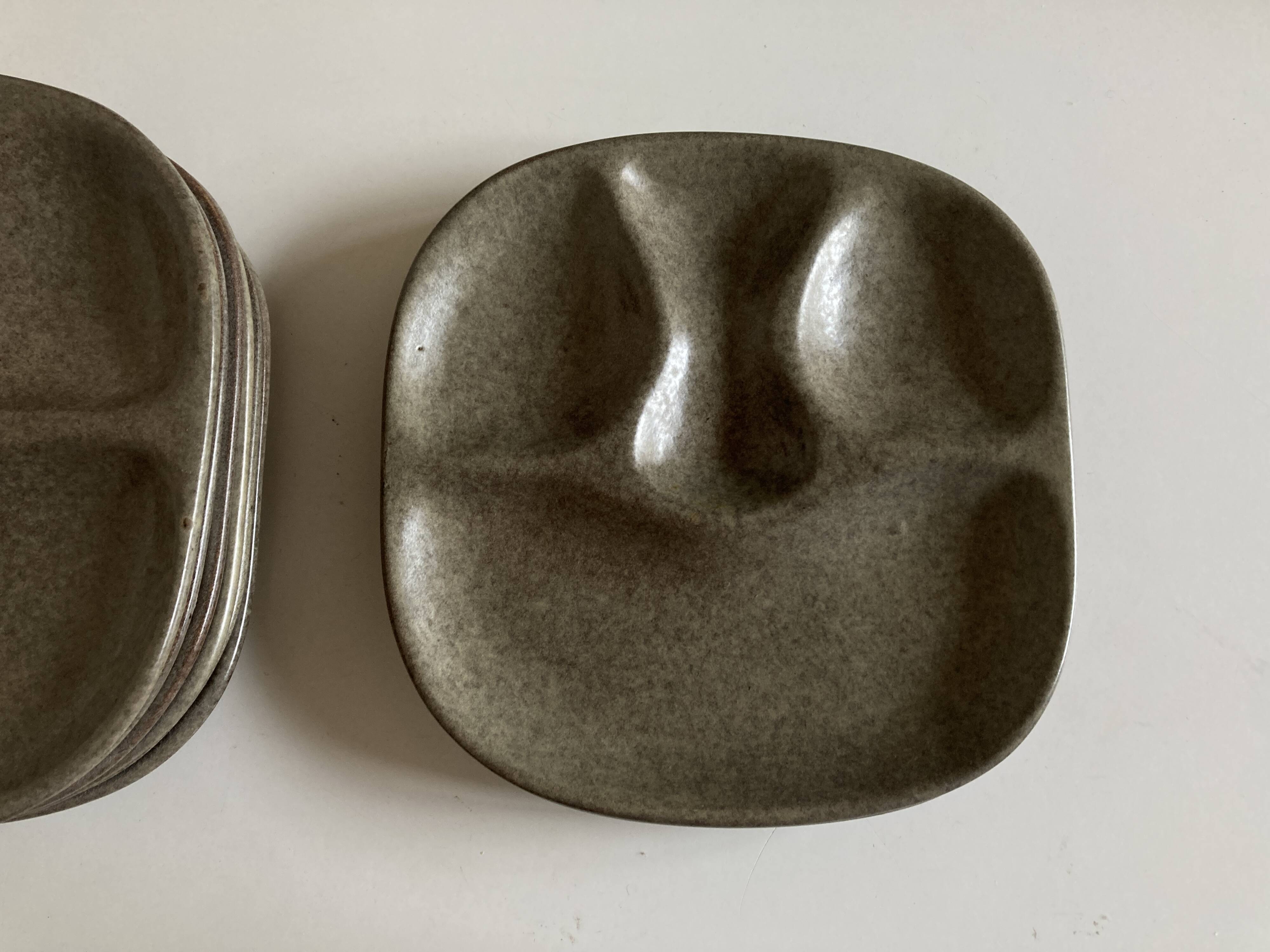 Set of 8 mid-century pottery plates Max Idlas 1960