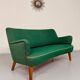 Old vintage green cocktail bean sofa from the 50s