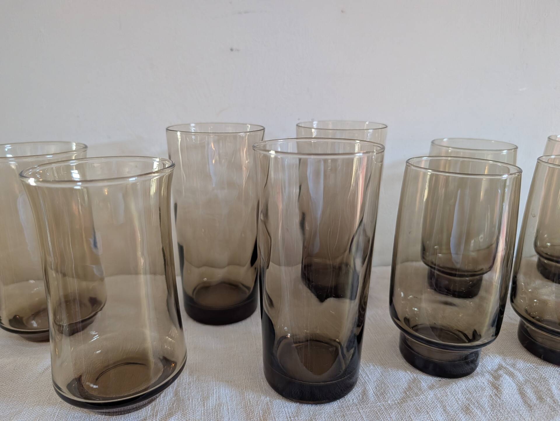 12 long drink glasses in smoked glass – 1970s