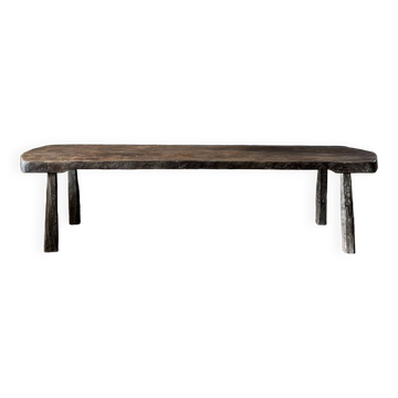 Large rounded coffee table in old Asian teak