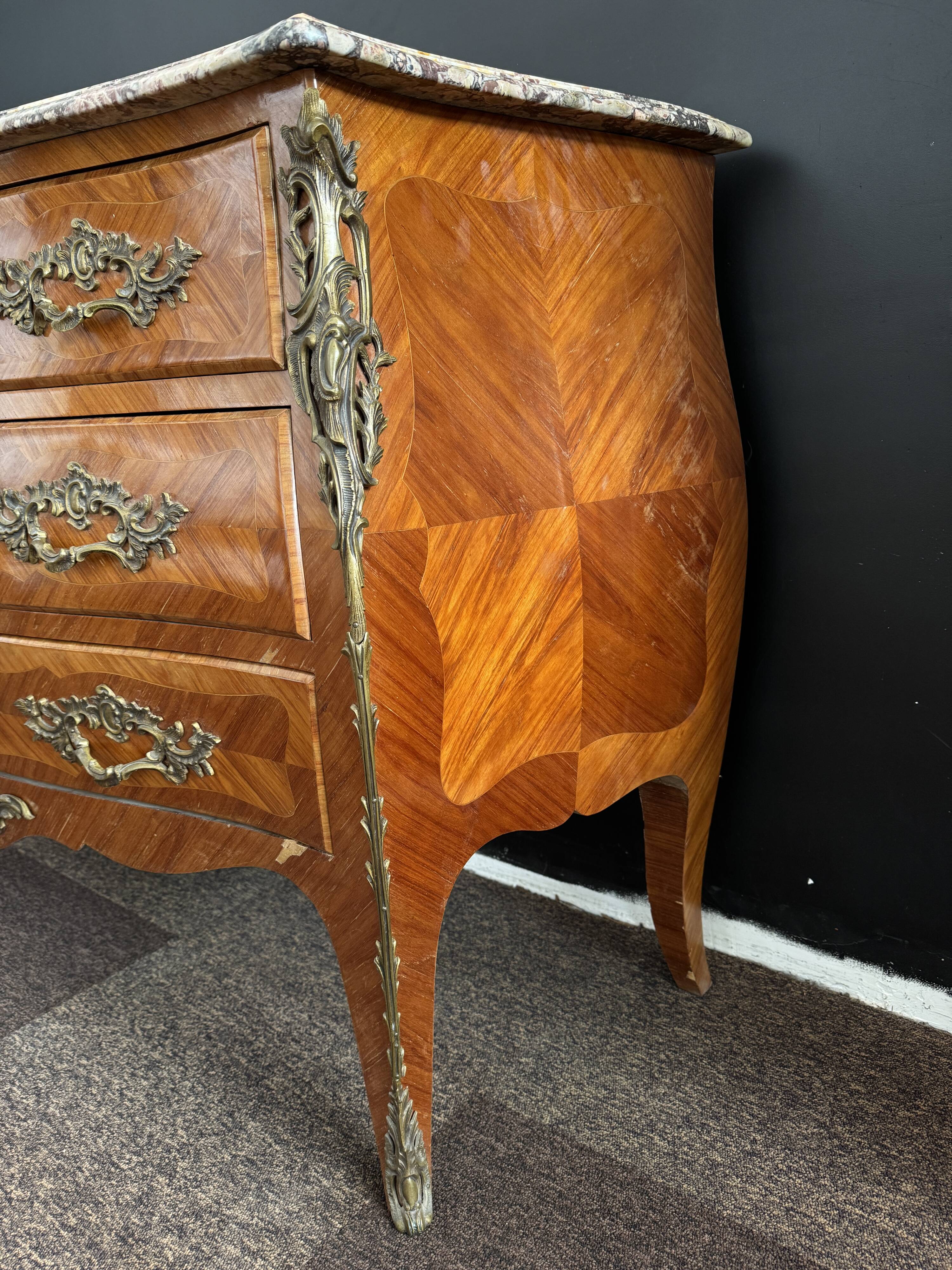 Bordeaux inlaid chest of drawers with marble and bronze ornament