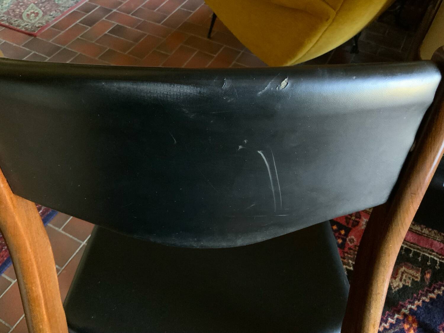 4 Scandinavian black leatherette chairs