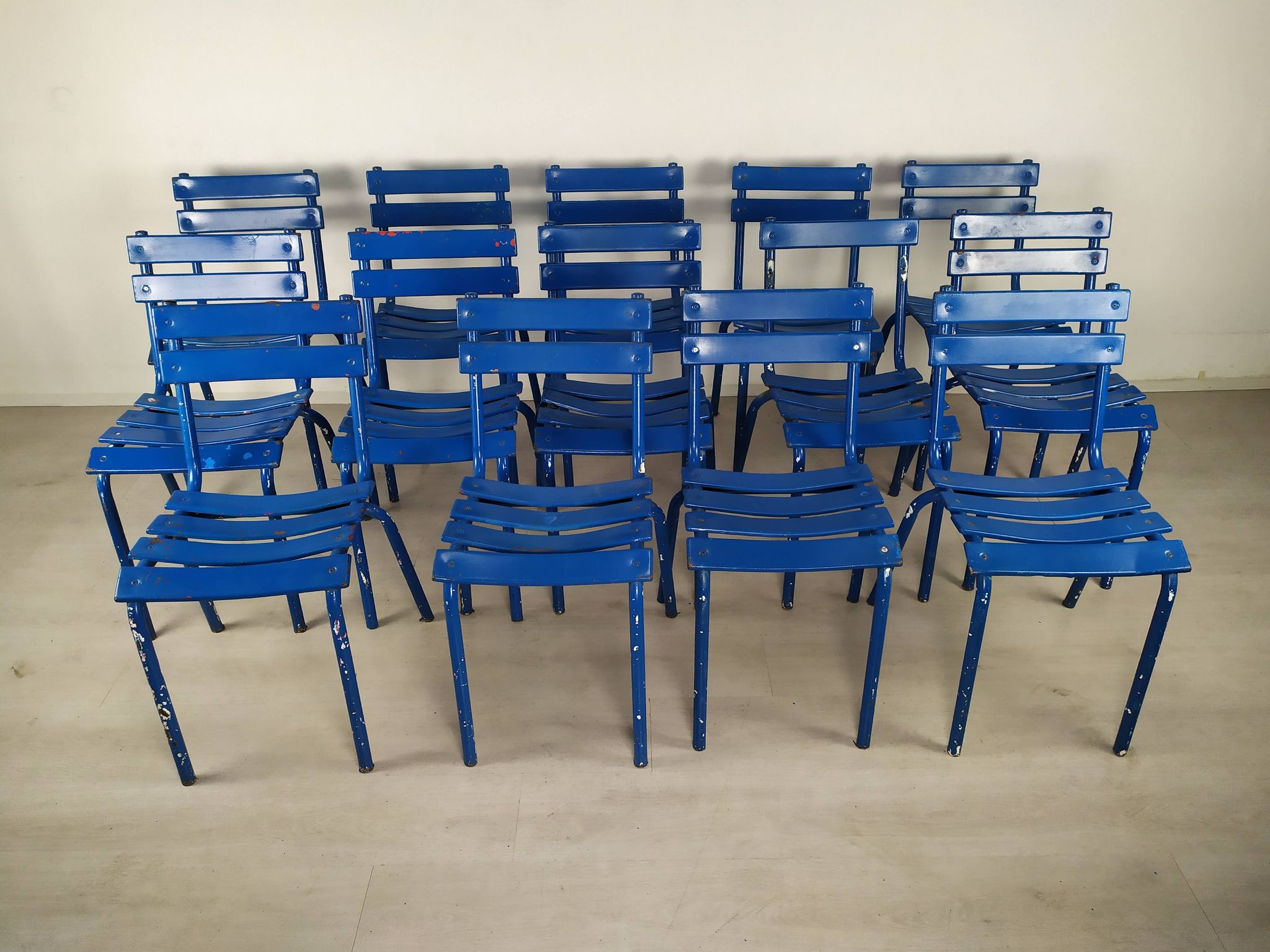 14 blue metal bistro chairs