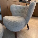 Armchair and footrest for & tradition