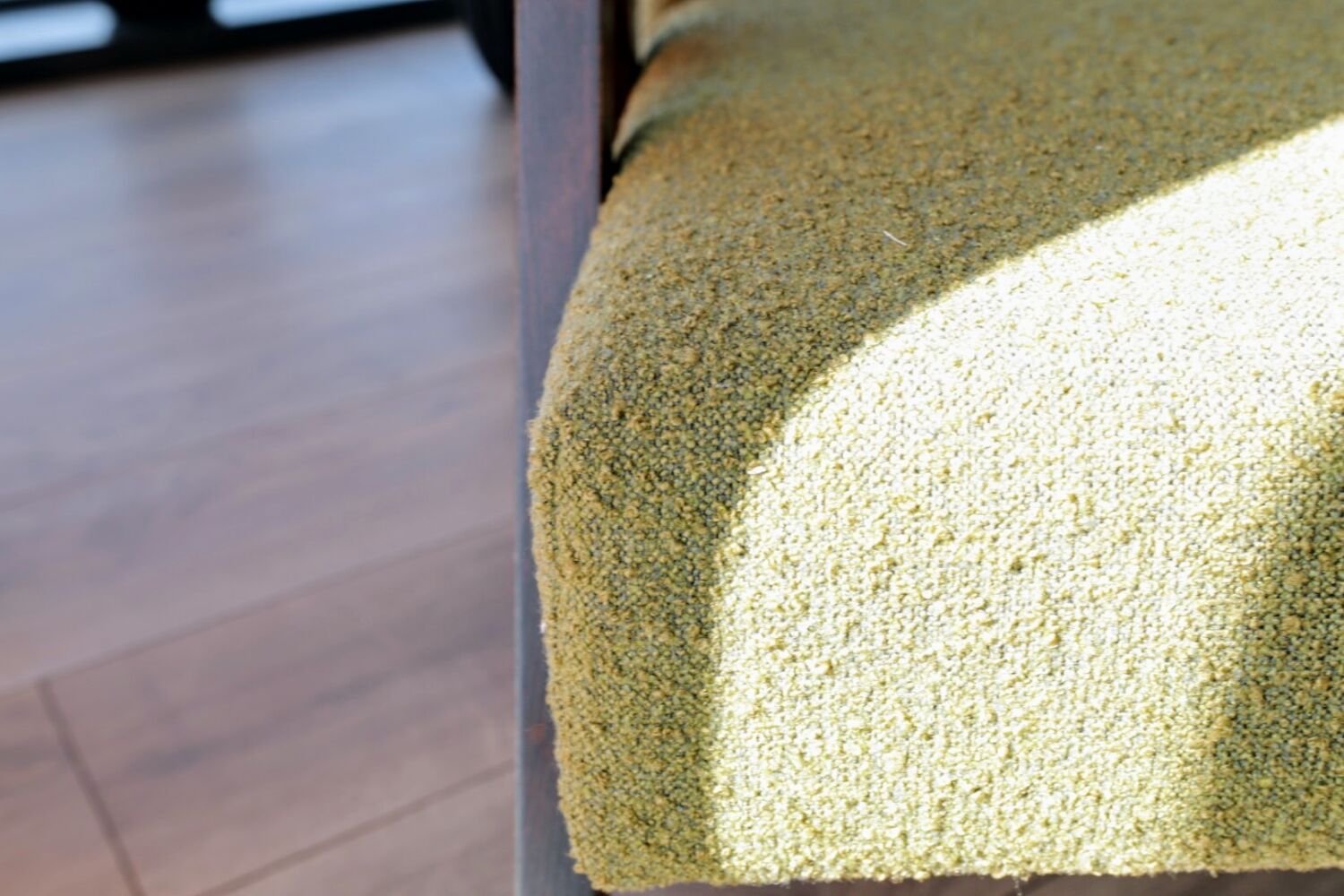 Vintage armchair in moss green bouclé design by H. Lis.