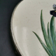 Underside of old faience dish
